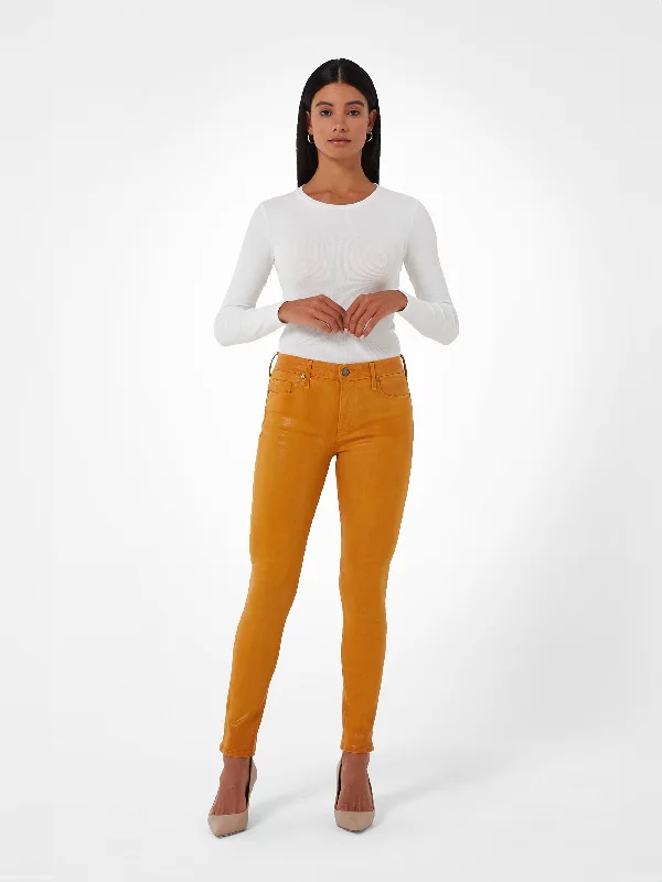 Acid - wash women jeans with a retro finish  Women's sleeveless romper pants Colored women jeans in vibrant hues like red and yellow Bowery Skinny in Slick Mustard